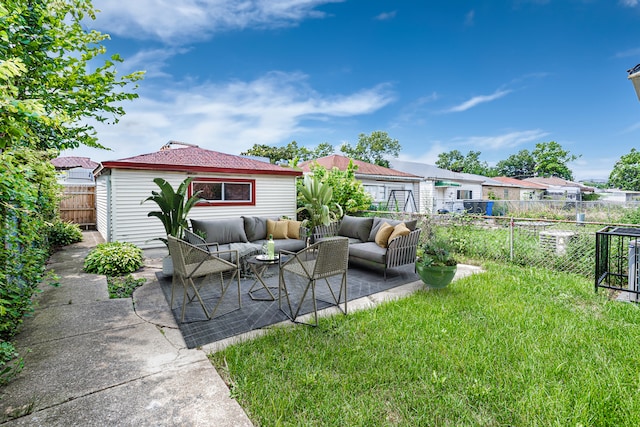 view of yard with a patio and outdoor lounge area