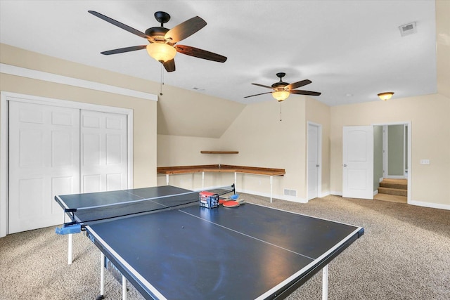 playroom featuring carpet and lofted ceiling