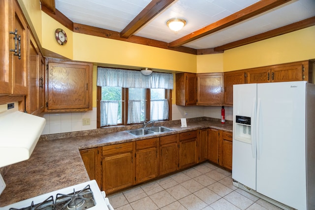 kitchen featuring decorative backsplash, beam ceiling, light tile patterned floors, sink, and white refrigerator with ice dispenser