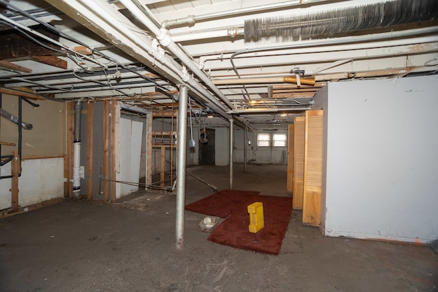 basement featuring gas water heater