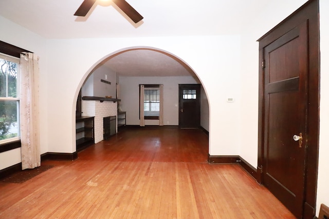 hall with light hardwood / wood-style floors