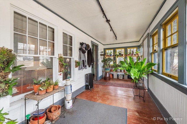 sunroom / solarium with track lighting