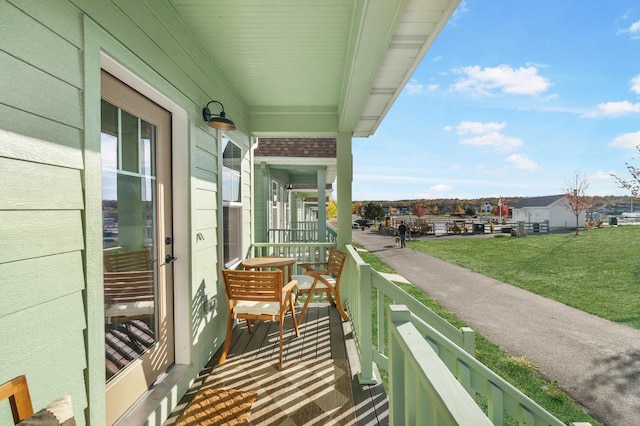 balcony featuring a porch