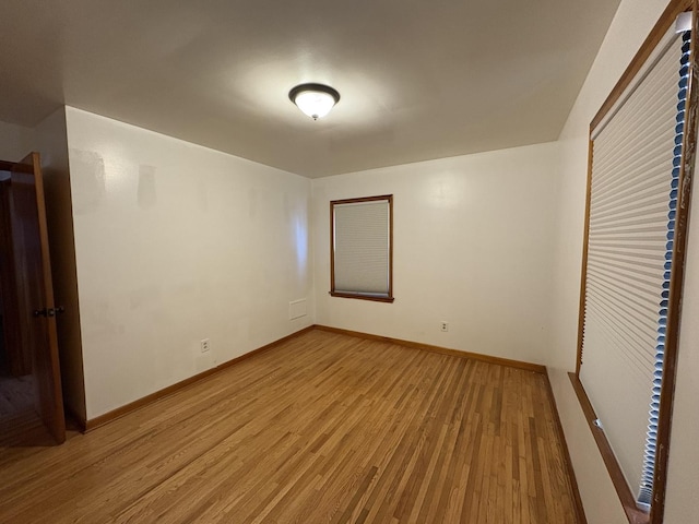 unfurnished bedroom featuring light wood-type flooring