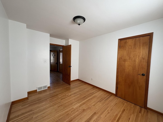 empty room featuring light wood-type flooring