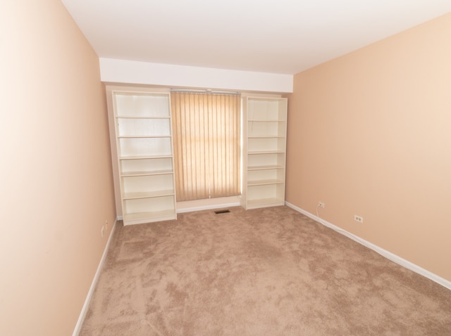 spare room with carpet floors