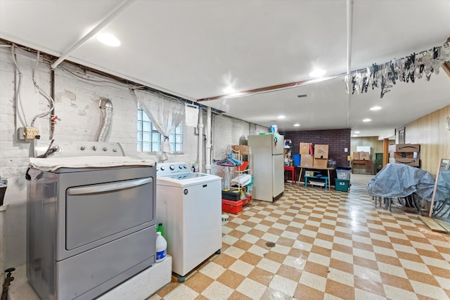 laundry room featuring separate washer and dryer