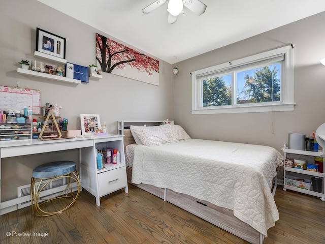 bedroom featuring dark wood-type flooring and ceiling fan