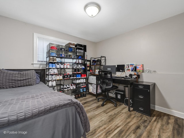 bedroom featuring hardwood / wood-style flooring