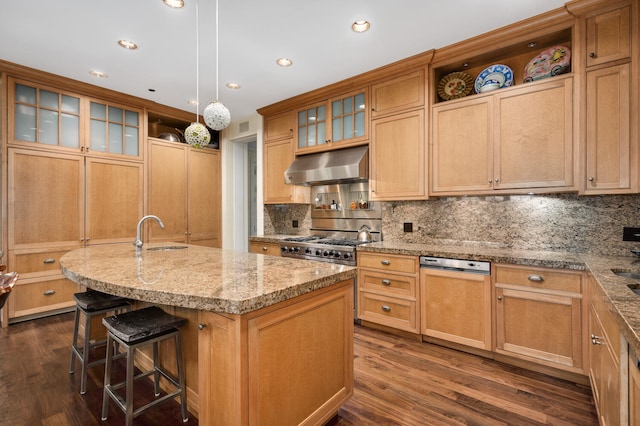 kitchen with sink, hanging light fixtures, dark wood-type flooring, ventilation hood, and a kitchen island with sink