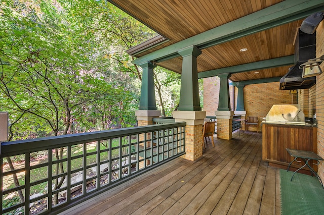 wooden terrace with grilling area