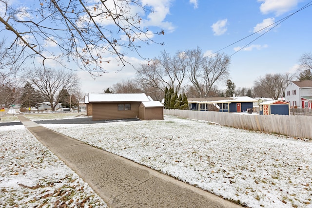 exterior space with a storage shed