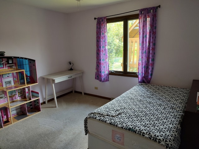 bedroom featuring carpet