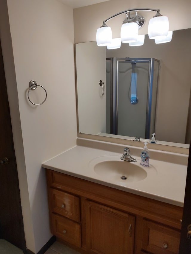 bathroom featuring vanity and walk in shower