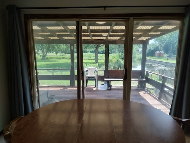 doorway to outside featuring wood-type flooring