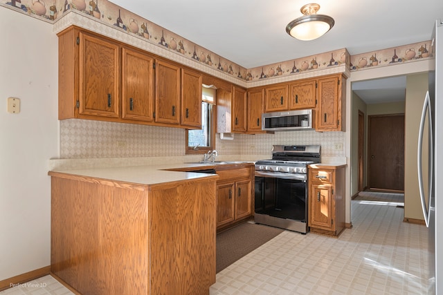 kitchen with sink and stainless steel appliances