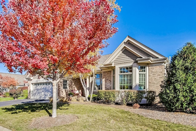 view of front of property with a front lawn