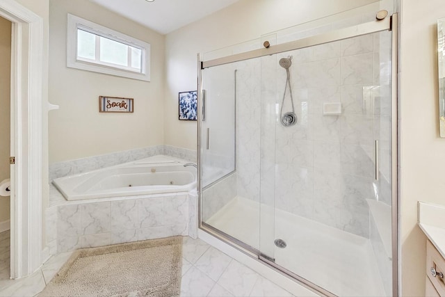 bathroom with vanity and plus walk in shower