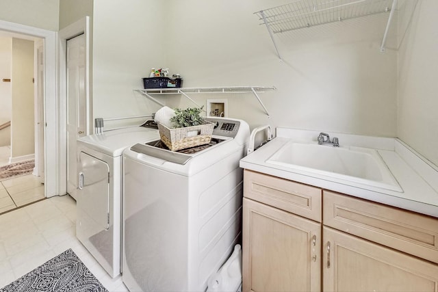 laundry room featuring sink and washing machine and clothes dryer