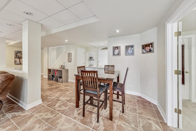 dining room featuring a paneled ceiling