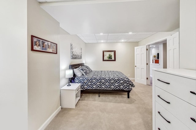 bedroom featuring light colored carpet