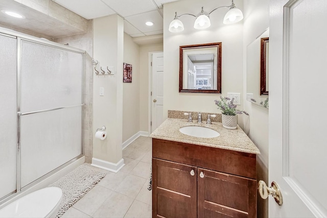 bathroom with vanity, tile patterned floors, and an enclosed shower