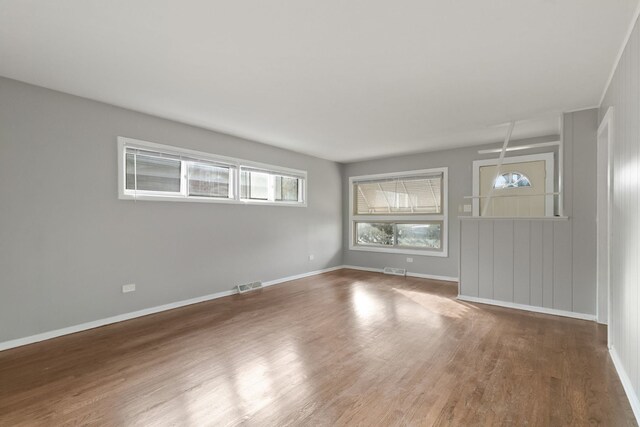 foyer with dark hardwood / wood-style floors