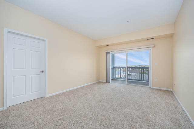 spare room with carpet flooring