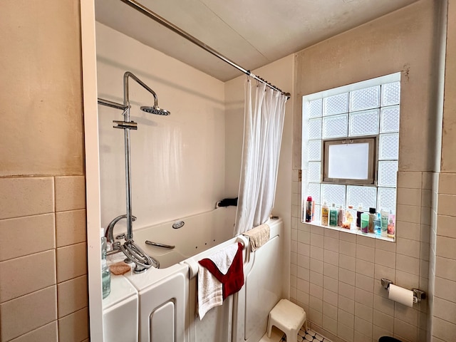 bathroom with toilet and separate shower and tub