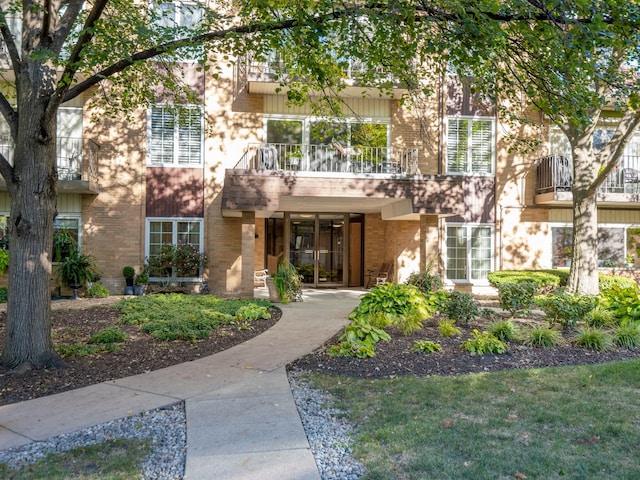 view of property featuring a balcony