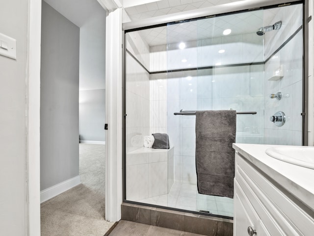 bathroom with vanity and walk in shower