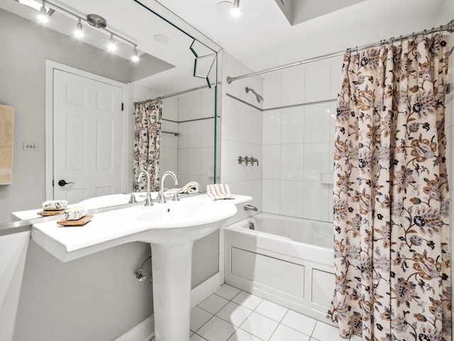 bathroom with tile patterned floors and shower / tub combo with curtain