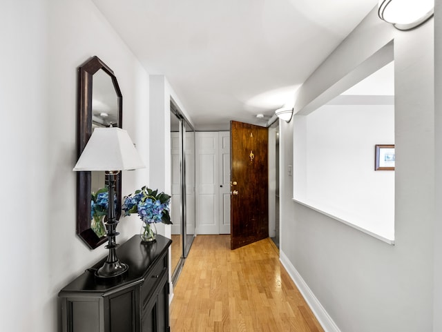 hall featuring light wood-type flooring