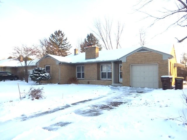 ranch-style home with a garage