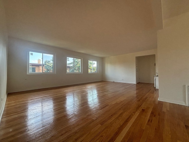 spare room with light hardwood / wood-style flooring