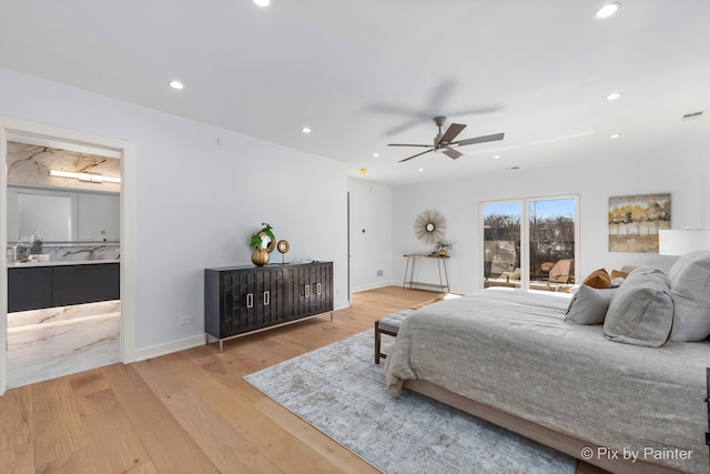 bedroom featuring light hardwood / wood-style floors and ceiling fan