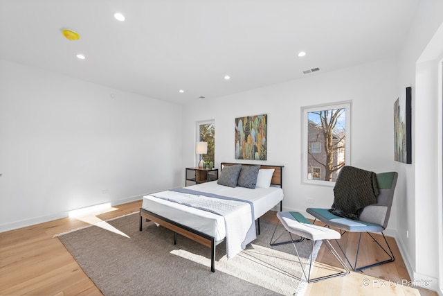 bedroom featuring light wood-type flooring