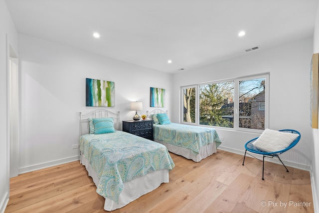 bedroom featuring light wood-type flooring