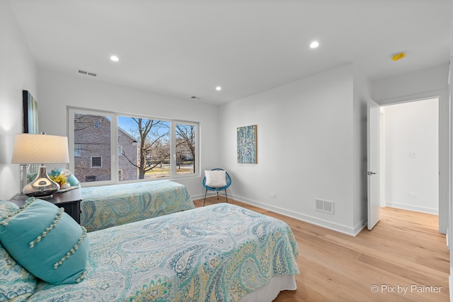 bedroom featuring light hardwood / wood-style flooring