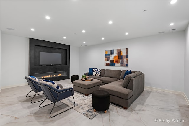 living room with a large fireplace