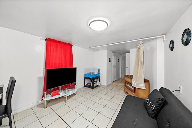 living room with tile patterned floors