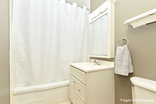 bathroom with vanity and shower / bath combo with shower curtain