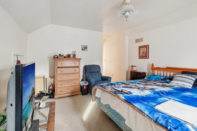 bedroom with vaulted ceiling