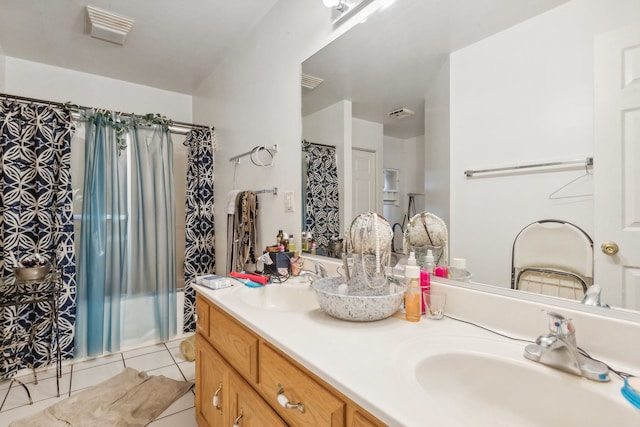 bathroom featuring vanity, a shower with curtain, and tile patterned flooring