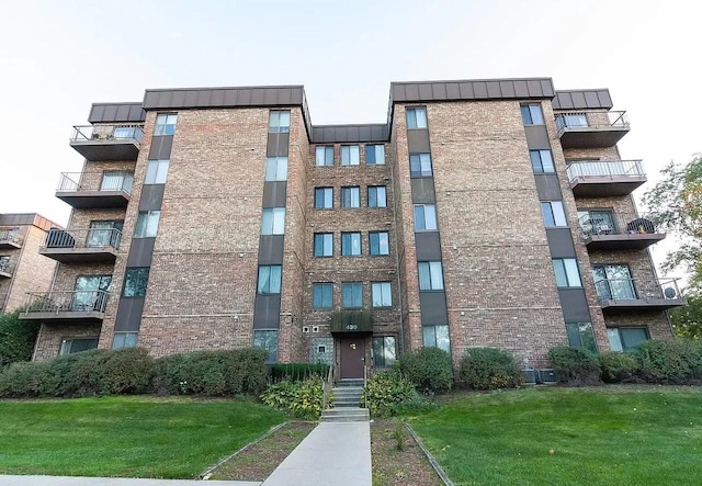 view of property with central air condition unit