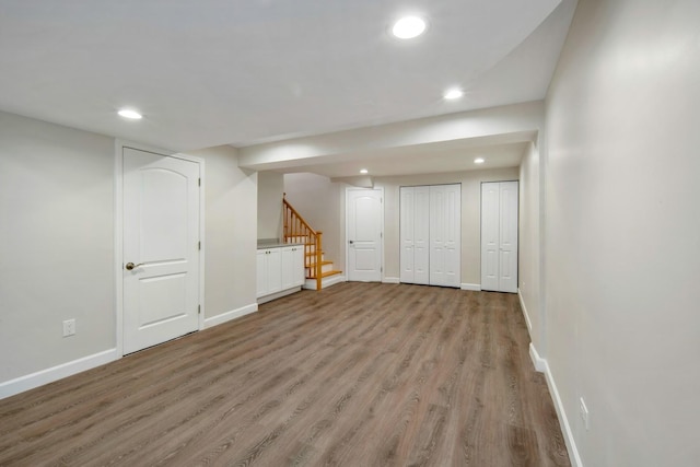 basement featuring light hardwood / wood-style floors