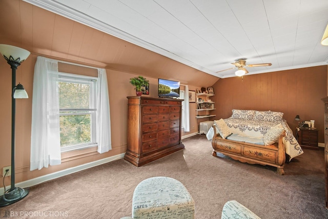 248 N Rohlwing Rd, Palatine, IL 60074 - carpeted bedroom featuring vaulted ceiling, ornamental molding, ceiling fan, baseboards, and wooden walls