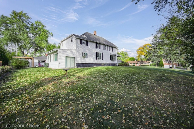 248 N Rohlwing Rd, Palatine, IL 60074 - rear view of property with a chimney and a yard