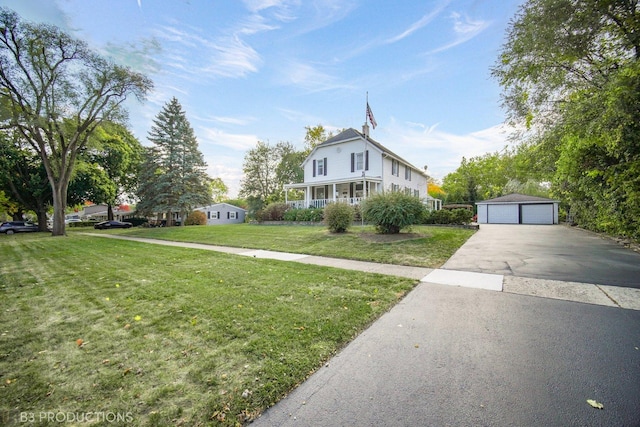 248 N Rohlwing Rd, Palatine, IL 60074 - view of front facade with an outbuilding, a garage, a front yard, and covered porch