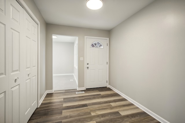 foyer featuring dark hardwood / wood-style floors